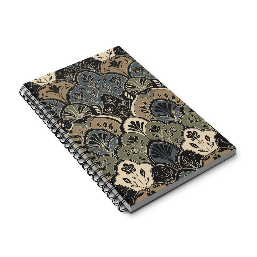 A spiral-bound notebook with a vintage-style Art Deco fan pattern in muted tones of beige, olive green, slate blue, and black, shown on a clean white background.