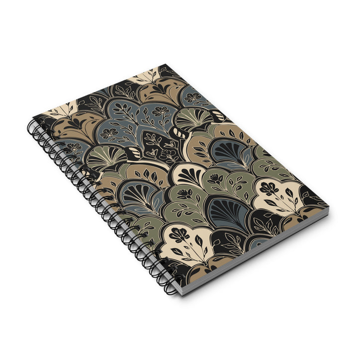 A spiral-bound notebook with a vintage-style Art Deco fan pattern in muted tones of beige, olive green, slate blue, and black, shown on a clean white background.