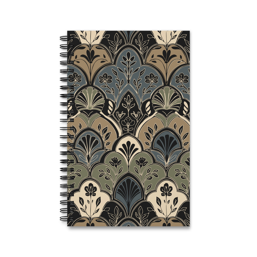 A spiral-bound notebook with a vintage Art Deco style pattern in muted tones of beige, olive green, slate blue, and black, shown on a plain white background.