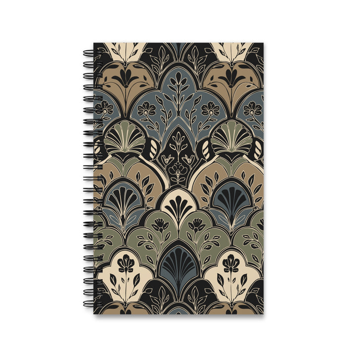 A spiral-bound notebook with a vintage Art Deco style pattern in muted tones of beige, olive green, slate blue, and black, shown on a plain white background.
