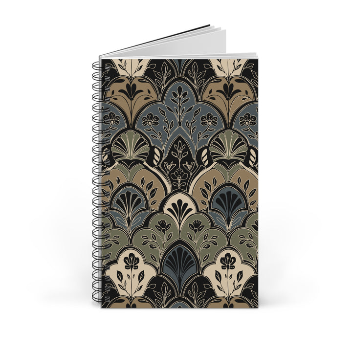A spiral-bound notebook with a vintage Art Deco style pattern on the cover, featuring shades of beige, slate blue, olive green, and black, shown on a clean white background.