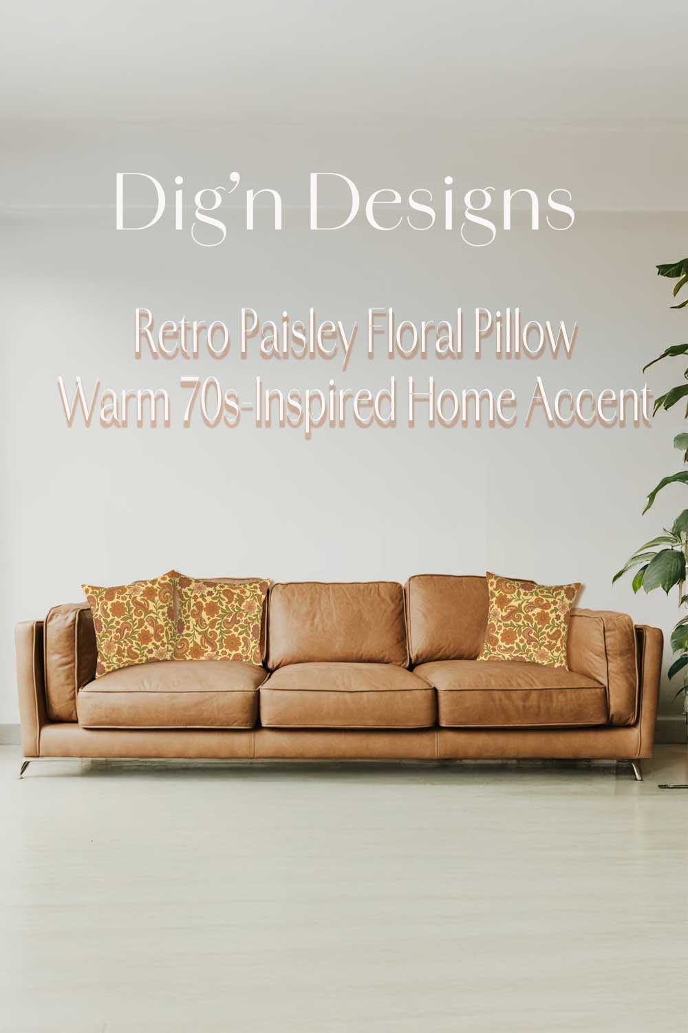 Brown sofa with retro paisley floral pillows against a light gray wall, featuring &