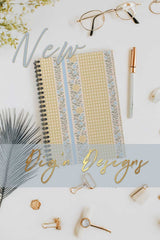 Decorative notebook with stationery items on a light background