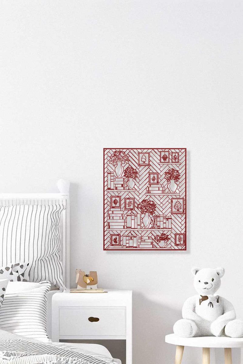 Decorative red and white patterned wall art in a bedroom setting.