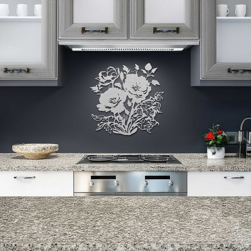 Modern kitchen with floral wall decal, stainless steel appliances, and granite countertops.