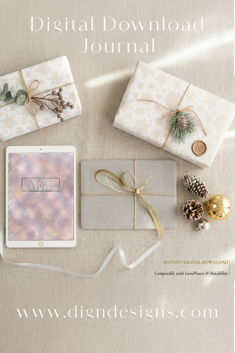Digital download journal with gift-wrapped items and a tablet on a beige background