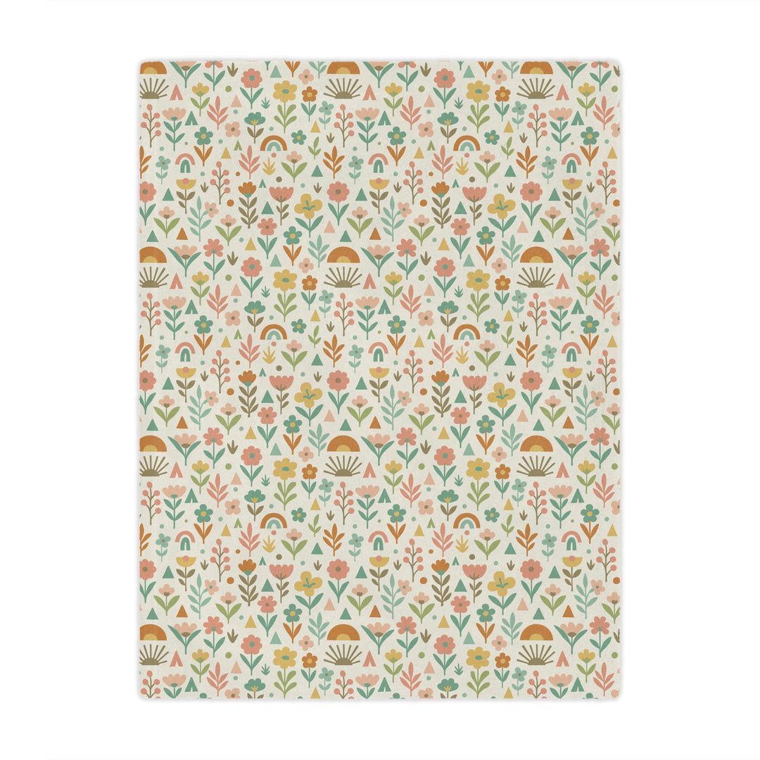 Floral patterned blanket with a white background
