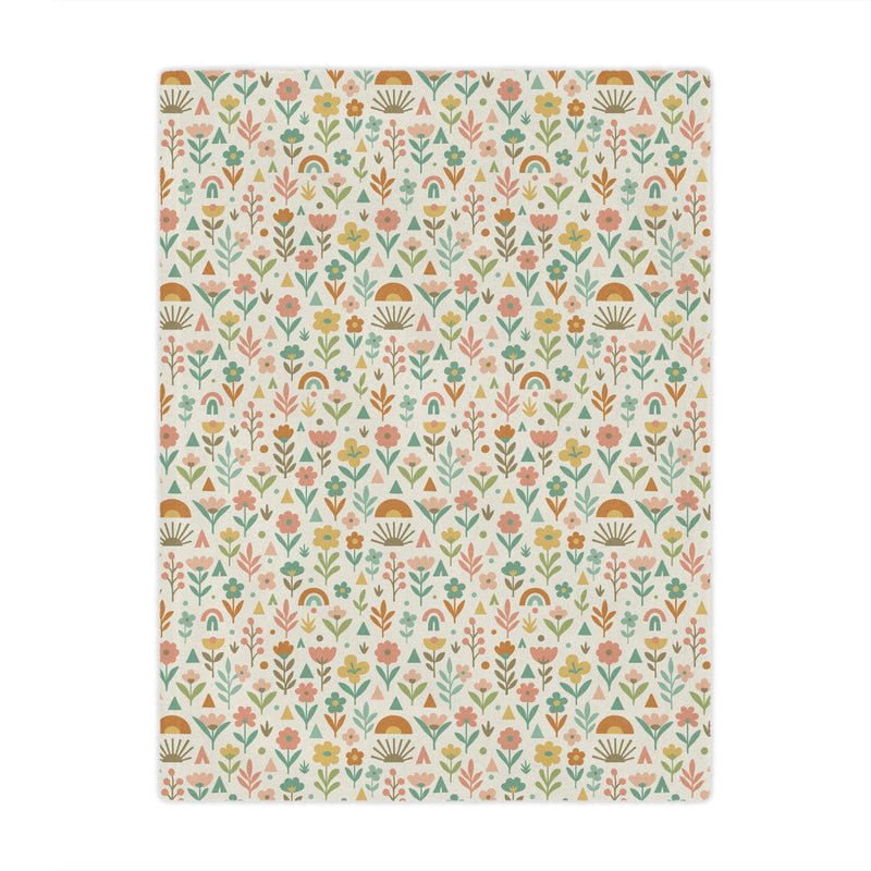 Floral patterned blanket with a white background