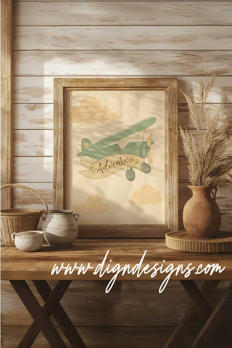 Framed artwork of a vintage airplane with 'Adventure' on a wooden table against a wooden wall.