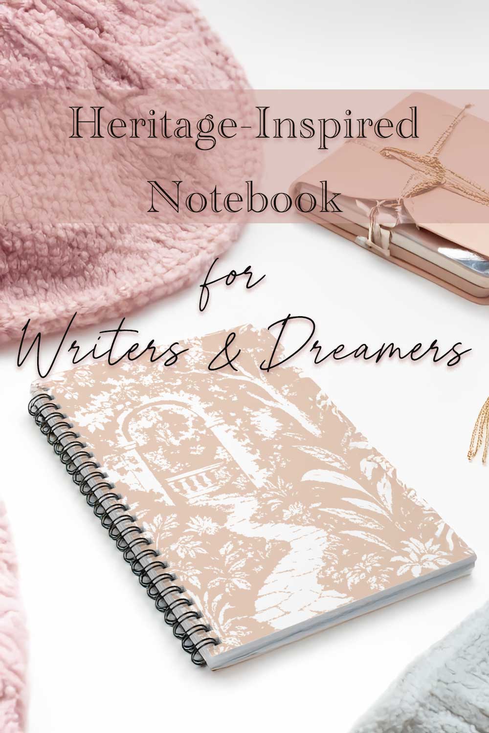 Heritage-Inspired Notebook for Writers &amp; Dreamers with decorative cover and pink textured object.
