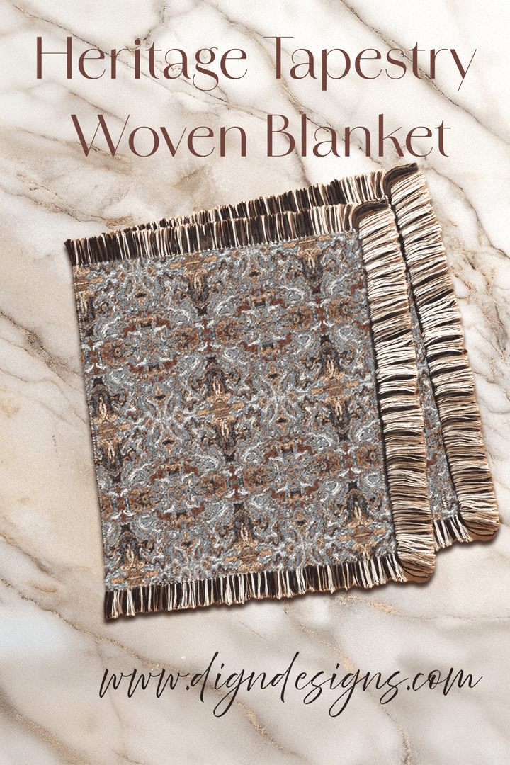 Heritage Tapestry Woven Blanket with decorative fringes on a marble surface, featuring the brand Dig&