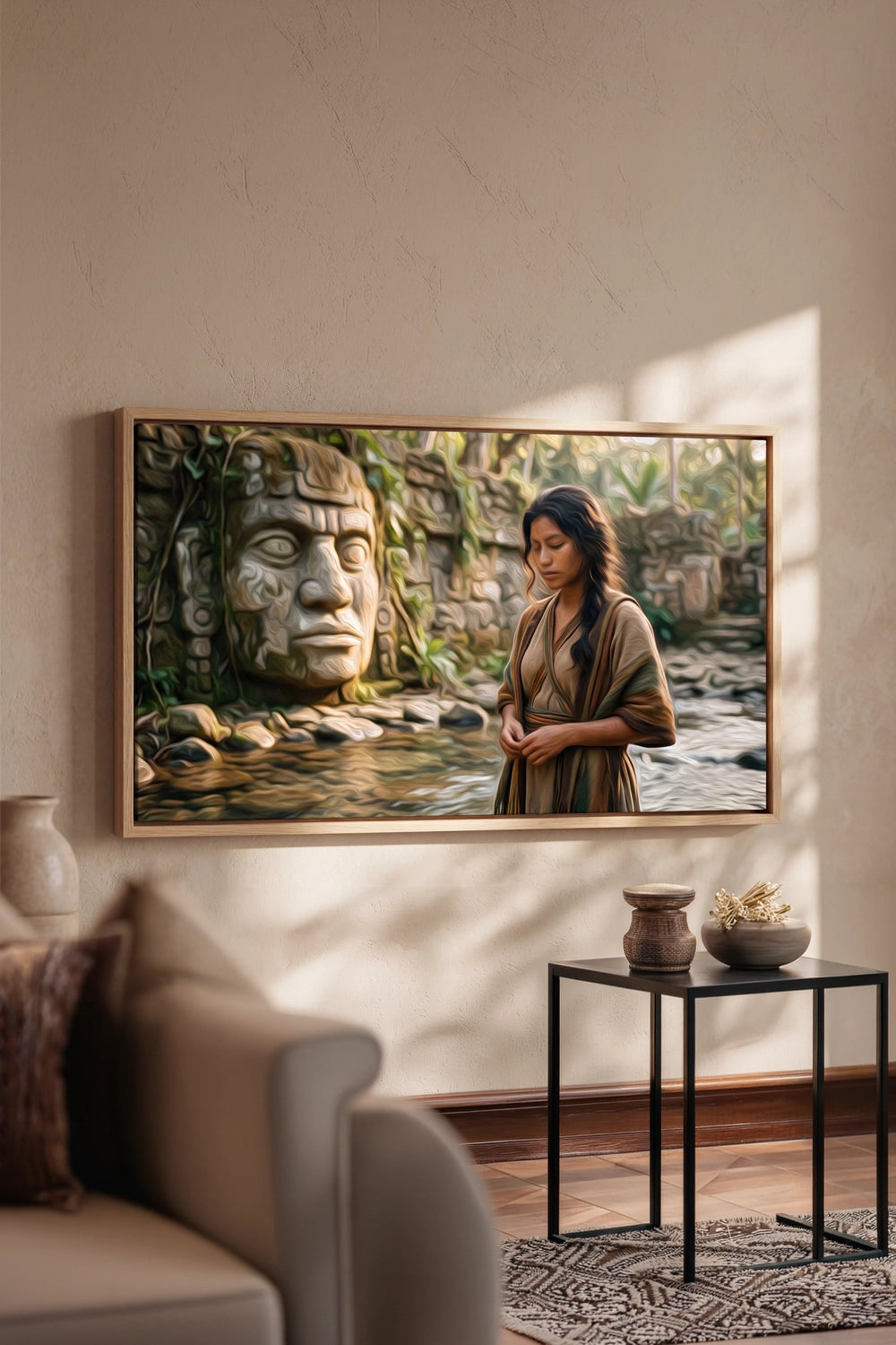 Living room with a large framed picture of a woman and an ancient statue.