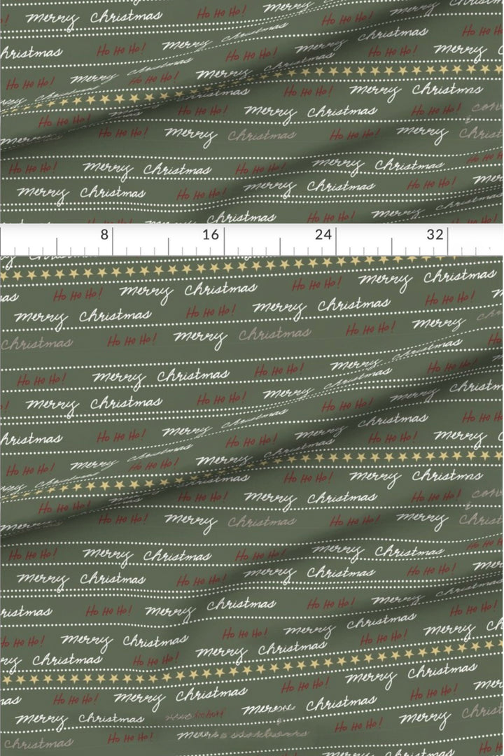 Merry Little Letters Christmas fabric with measurements showing the pattern scale of the script lettering print