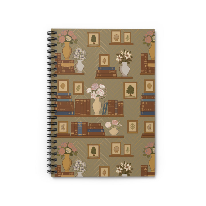 Notebook with a decorative cover featuring books, vases, and flowers on a beige background