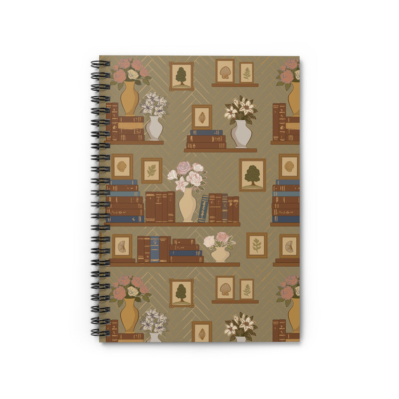 Notebook with a decorative cover featuring books, vases, and flowers on a beige background