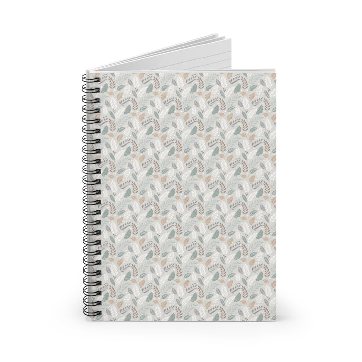Notebook with a patterned cover on a white background