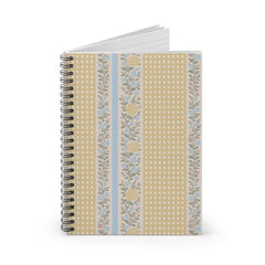 Notebook with floral and checkered design on a white background