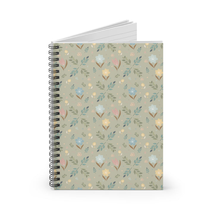 Notebook with floral pattern on a white background