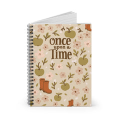Notebook with 'once upon a time' text and floral design on a white background