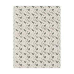 Patterned blanket with small butterfly  and butterfly design on a beige background