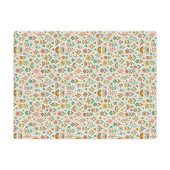 Patterned mat with floral and geometric design on a white background