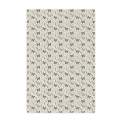 Patterned rug with small butterfly illustrations on a light background