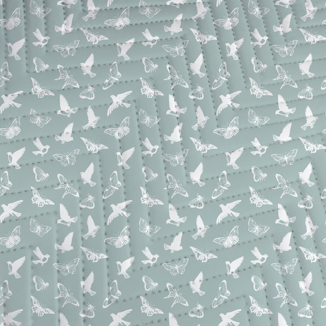 Quilted Throw Blanket – Serene Birds &amp; Butterflies - White Silhouette on Teal close up of the quilting