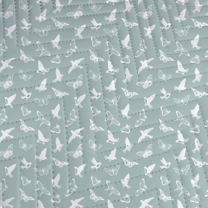 Quilted Throw Blanket – Serene Birds &amp; Butterflies - White Silhouette on Teal close up of the quilting