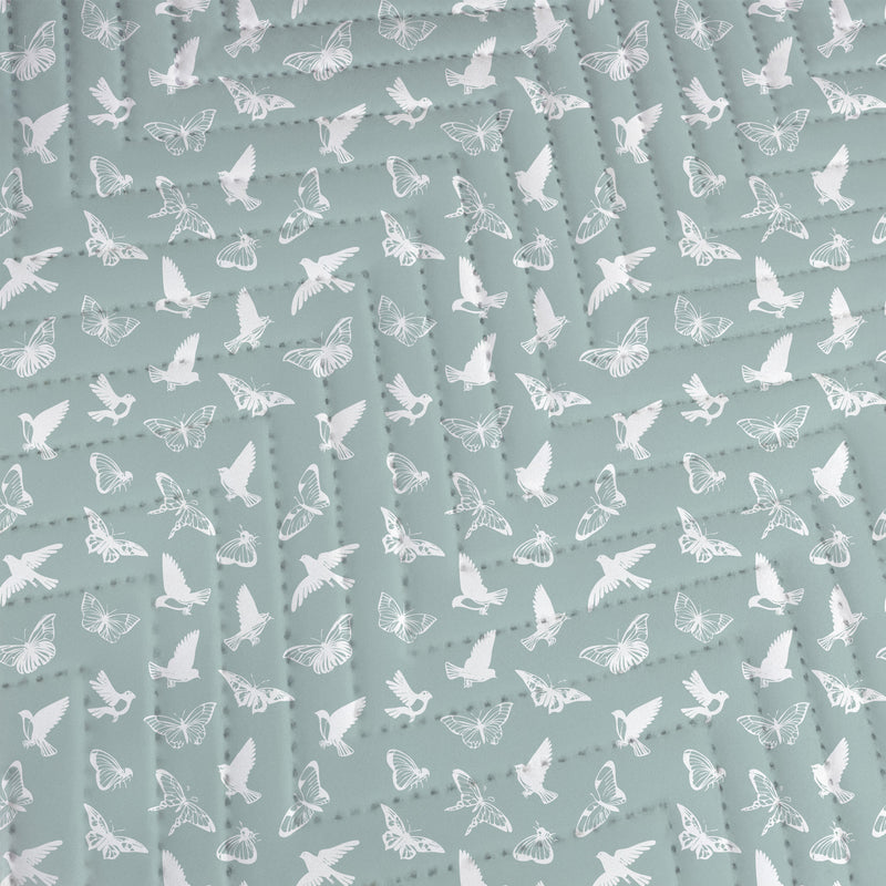 Quilted Throw Blanket – Serene Birds & Butterflies - White Silhouette on Teal close up of the quilting