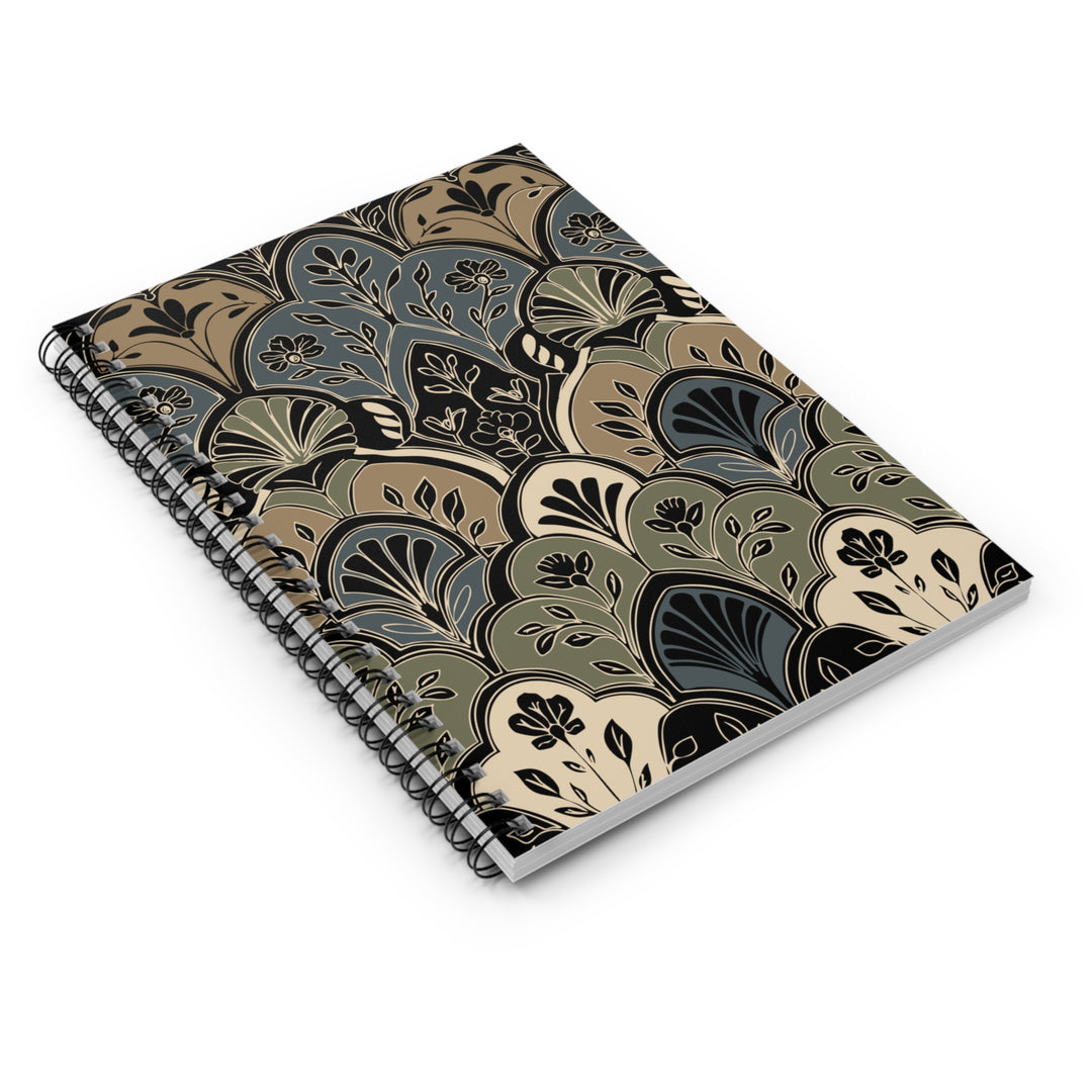 Spiral-bound notebook with a decorative pattern on a white background