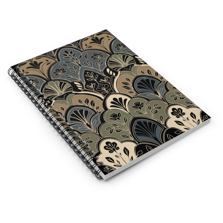 Spiral-bound notebook with a decorative pattern on a white background
