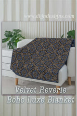 Velvet Reverie Boho Luxe Blanket draped over a white sofa with a neutral background.