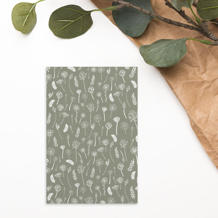 extra wide white traced flowers bookmark on table with flowers