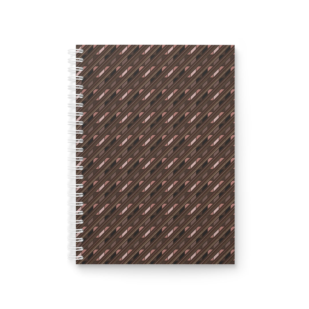 A spiral-bound notebook with a dark brown cover featuring a repeating diagonal geometric pattern in black and metallic rose gold, shown on a plain white background.