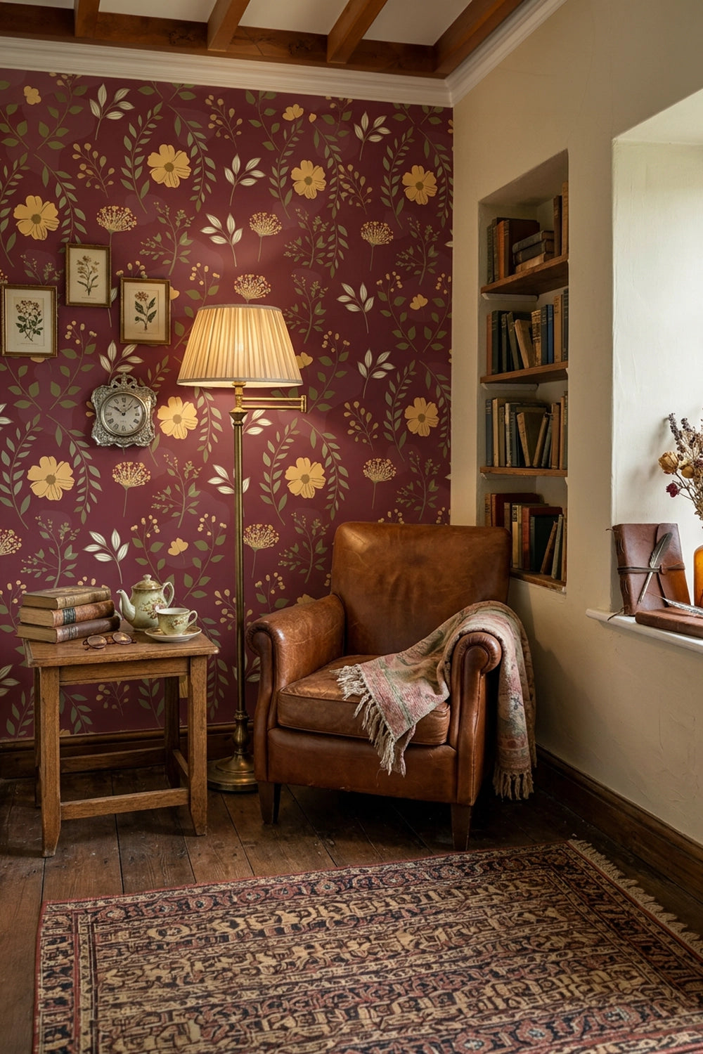 A cozy interior corner with burgundy floral wallpaper, a brown leather armchair, a floor lamp, a small wooden side table, and a patterned rug. No person or animal is present, and the scene appears to be a styled room rather than a clean isolated product shot.