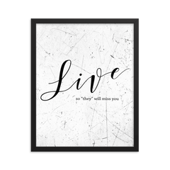 Wall display of saying that says live so they will miss you in a black frame