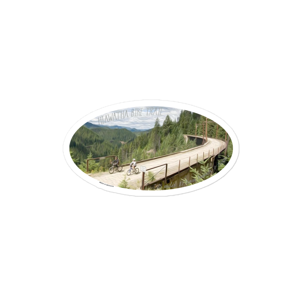 this sticker is an oil painting/picture of part of the Hiawatha trail.