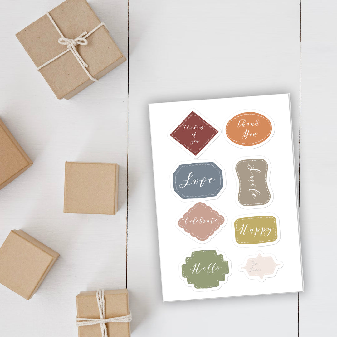 Package tag sticker sheet on display on table with gifts