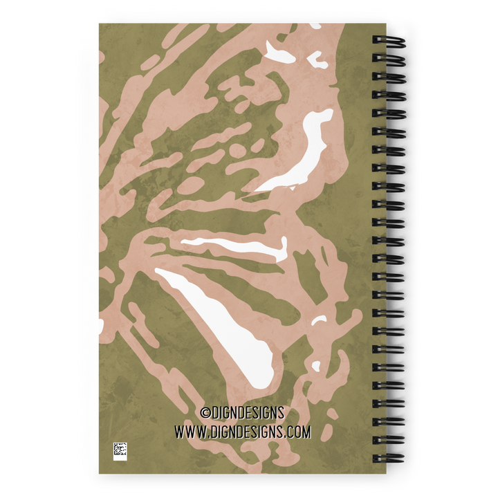 Picture of the back of a green notebook with half of a coral colored butterfly with detailed wings.