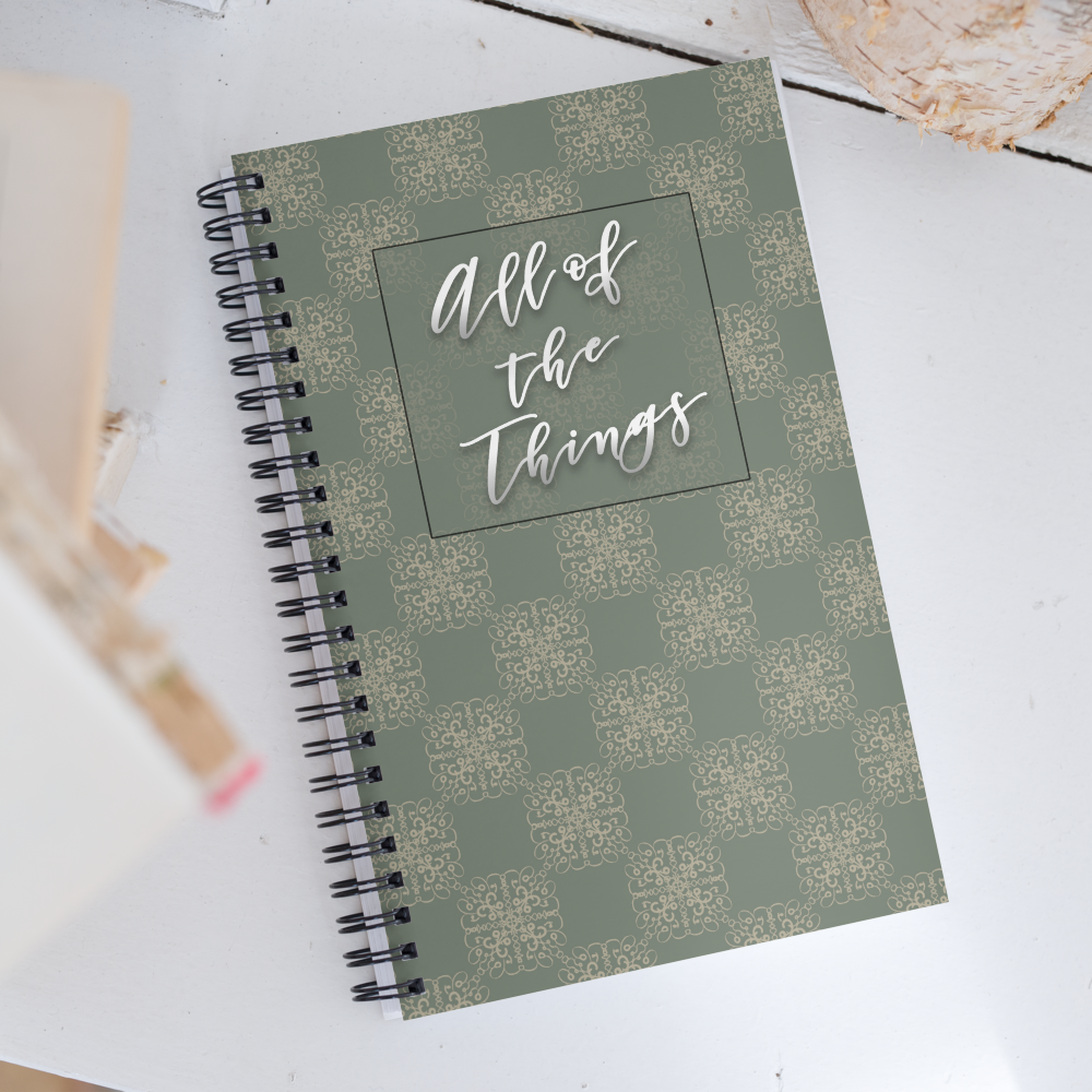 The product display of a notebook or journal with the saying "all of the things" on it