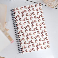 Baby rose notebook display on a table