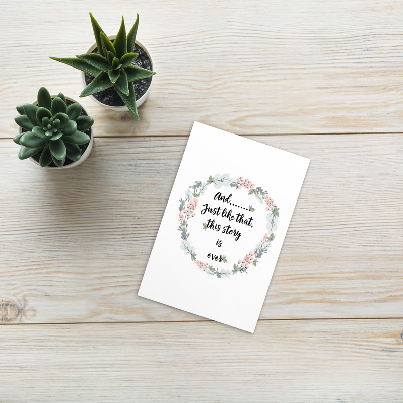  picture of the extra wide floral book mark with the quote on it sitting on a table with succulents beside it