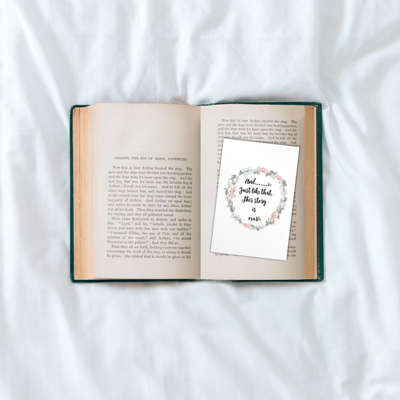 open book with extra wide bookmark with cute quote and floral wring around the quote