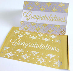 Product display of the words Congratulations as a cut out for cutting machines.  This product display shows someone who used this cut out on a card face.  It also shows a gold foil that was used to make the card gold where the words congratulation are placed.  It also shows the gold foil negative that is also a very pretty craft.  