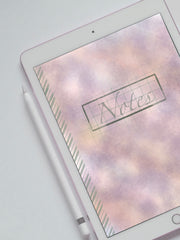 Example of a Pink Water Color digital notebook on display with an ipad pro displaying the cover.