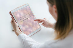 Digital Pink Watercolor notebook on an ipad with a lady showing how to use it